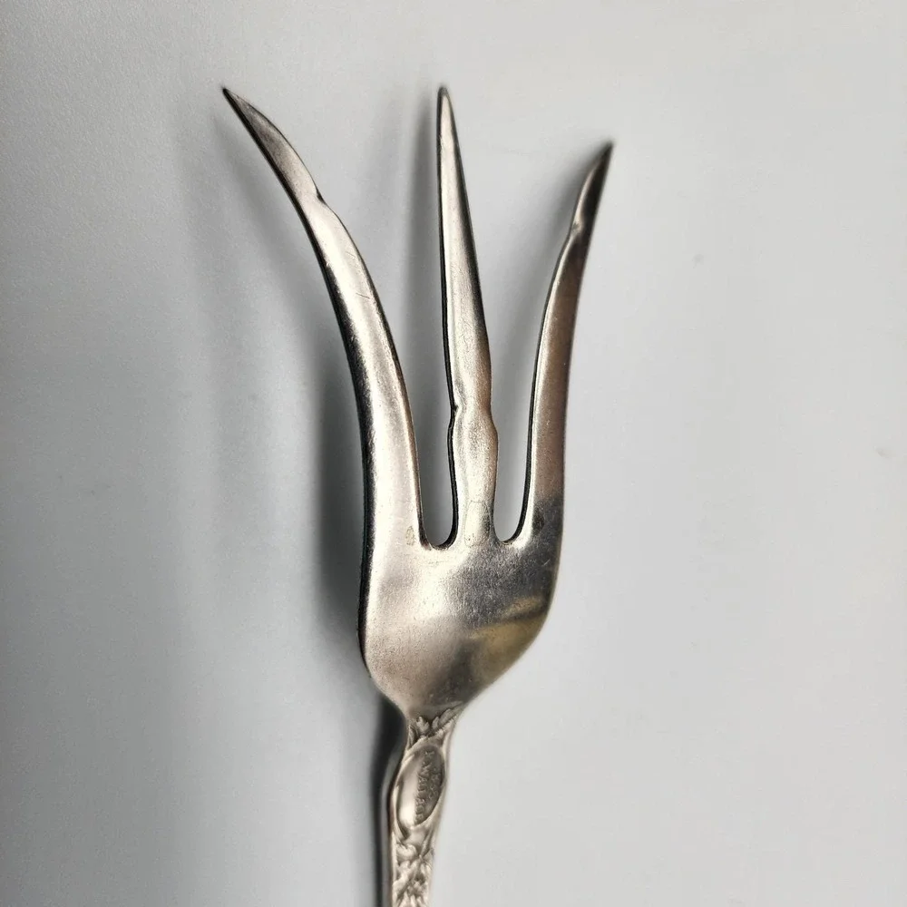 Silver serving fork by R. Wallace 1835 A1 Blossom pattern 8.75
